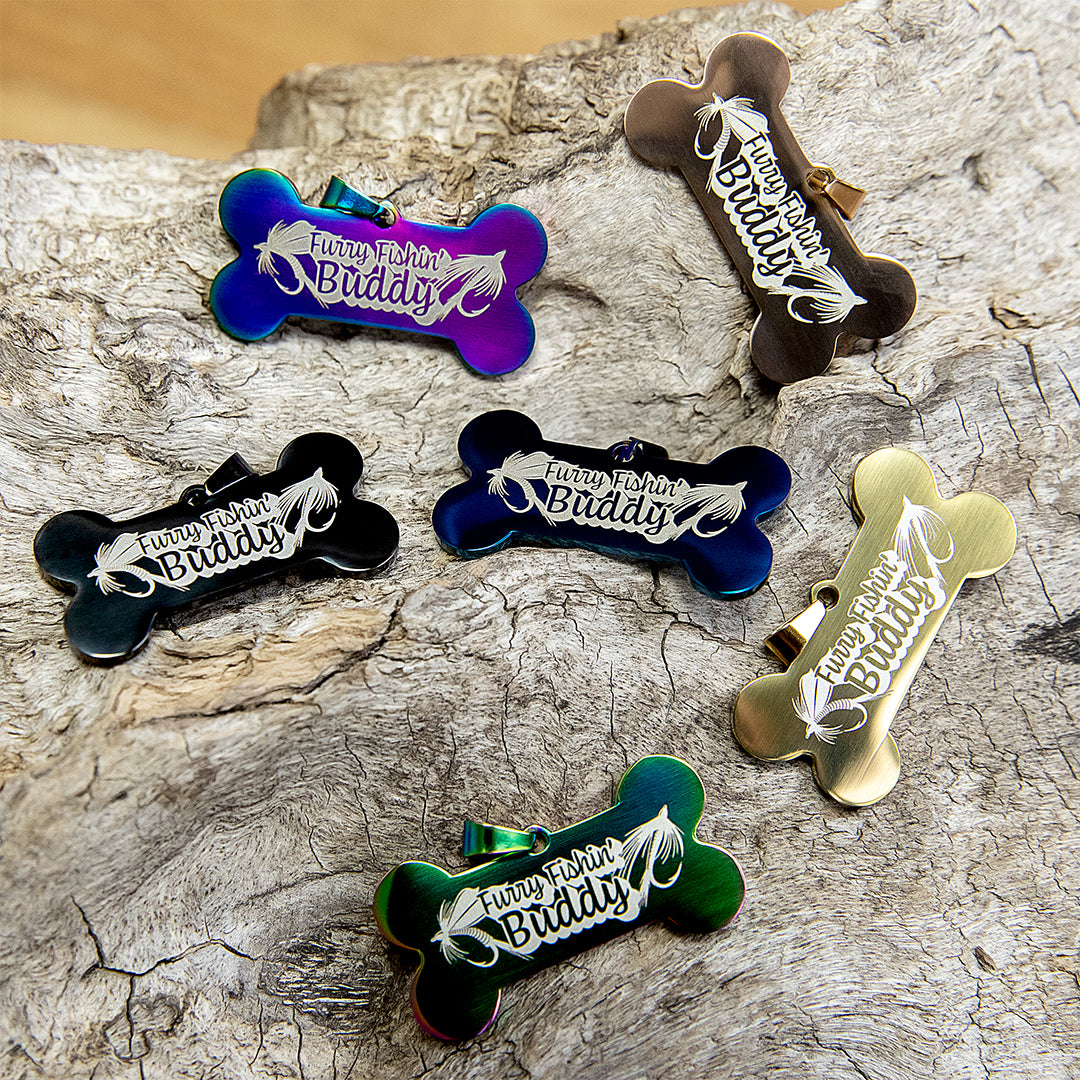 Set of bone-shaped pet tags with 'Furry Friend Buddy' text on a stainless steel dog tag.